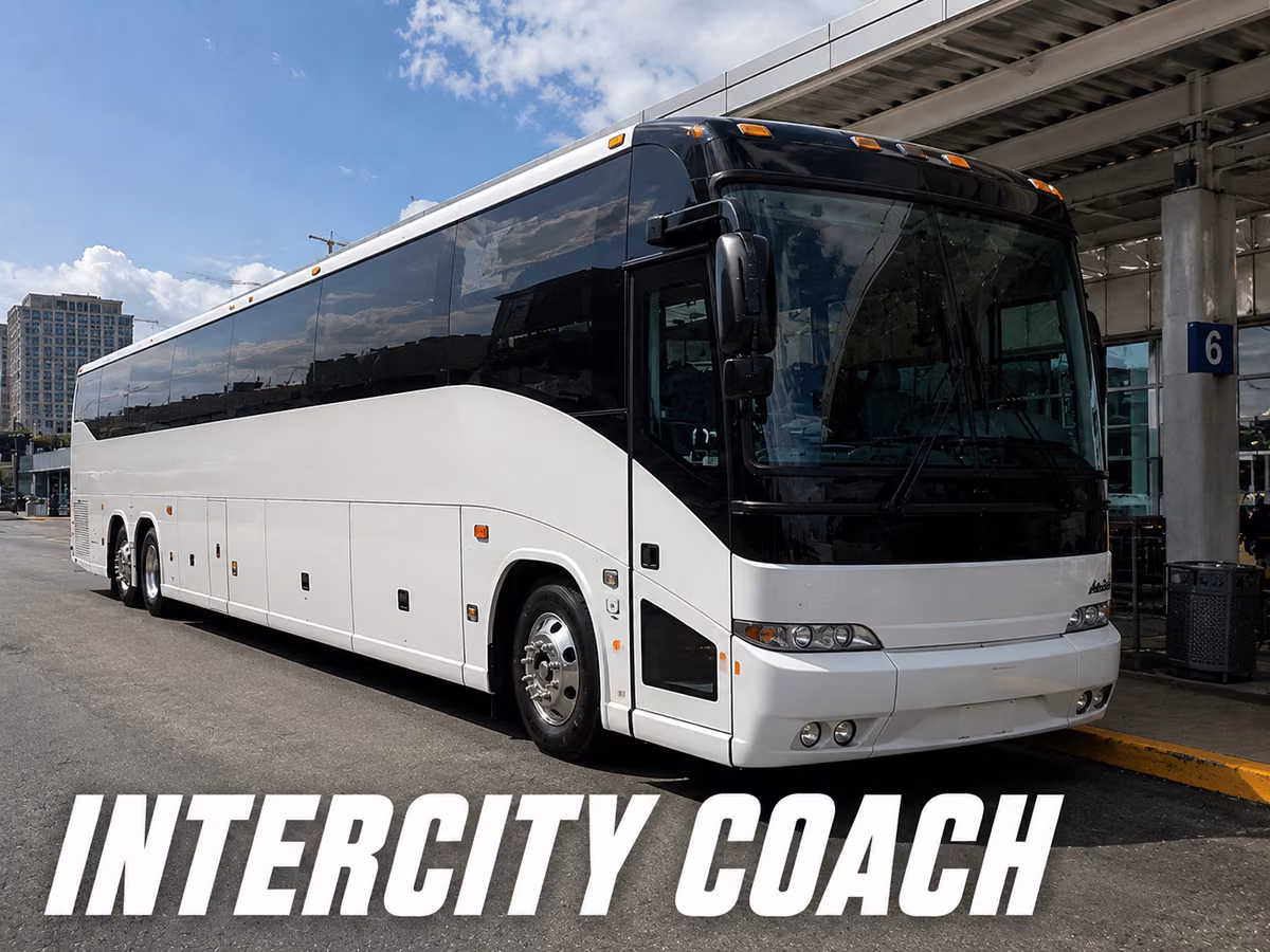 Black and white intercity coach waiting at a covered terminal bay