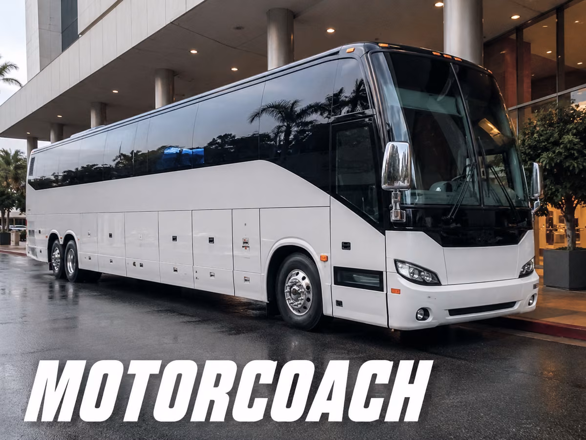 White 45-foot motorcoach with a row of underfloor luggage bay doors along its side