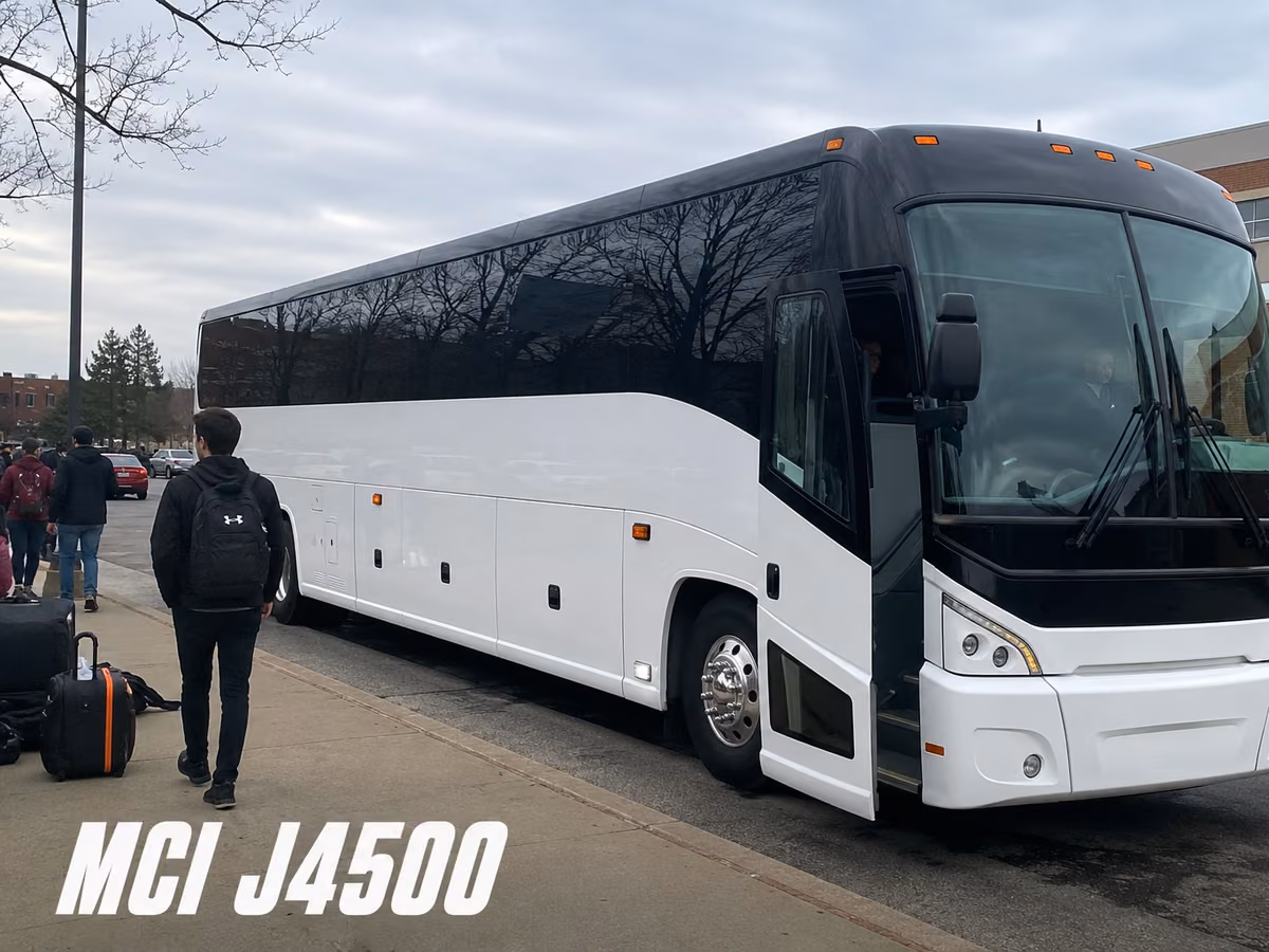 White MCI J4500 coach parked on pavement with passengers boarding