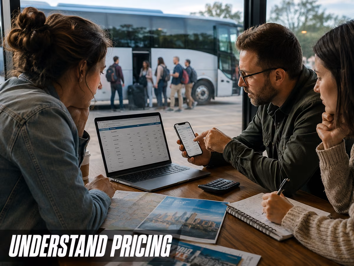 A group of people reviewing rates on a laptop and phone at a table.