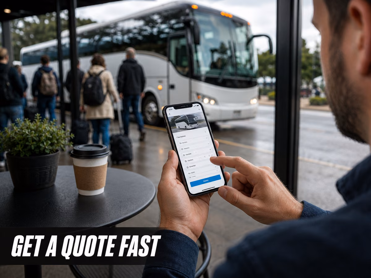 A man at a cafe table filling out a quote request form on his phone with a bus in the background.
